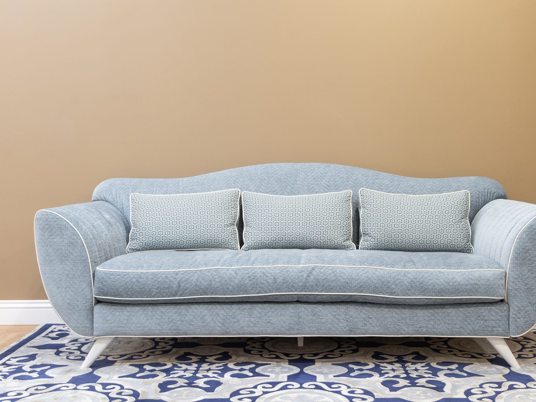 Light blue upholstered sofa freshly cleaned in a Capitola living room